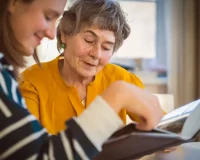 Resident looking at Photo Album