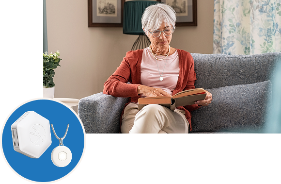 An older woman with gray hair and glasses reads a book on a couch. Inset shows a medical alert pendant and a base unit, suggesting a medical alert system for seniors.